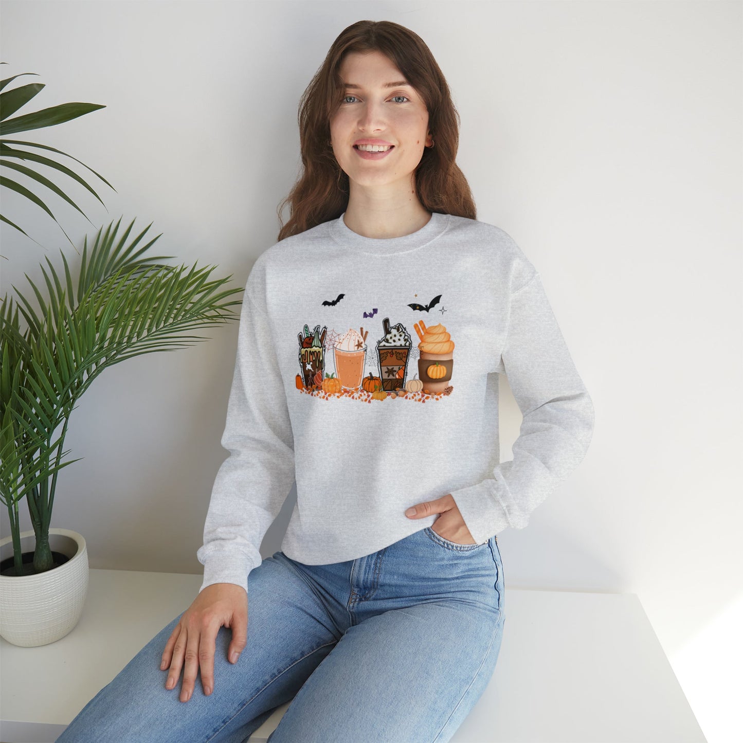 Get trendy with Festive and Spooky Coffee Heavy Blend™ Crewneck Sweatshirt - Sweatshirt available at Good Gift Company. Grab yours for $25.95 today!