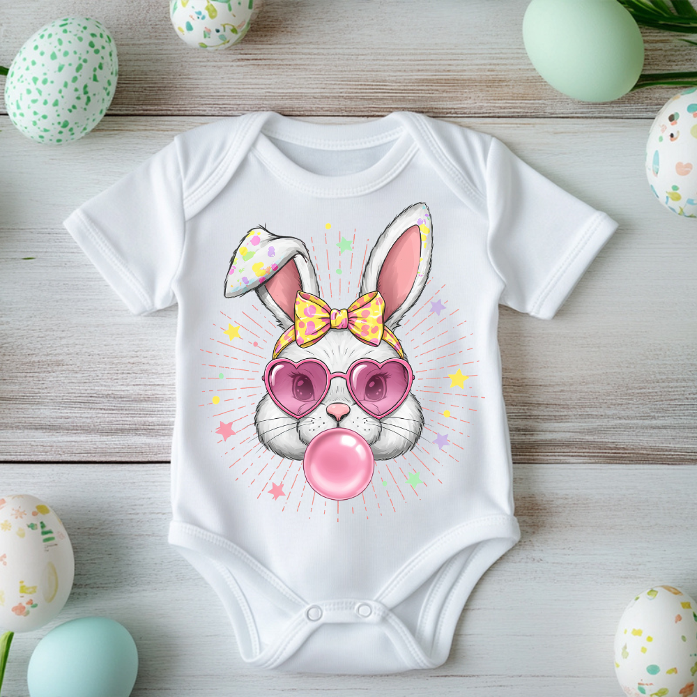 Soft and cute baby bodysuit with Easter bunny and pastel bow.