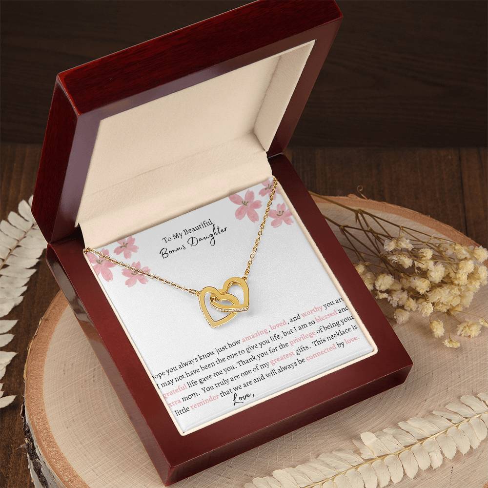 Get trendy with To My Bonus Daughter Interlocking Hearts Necklace - Jewelry available at Good Gift Company. Grab yours for $59.95 today!