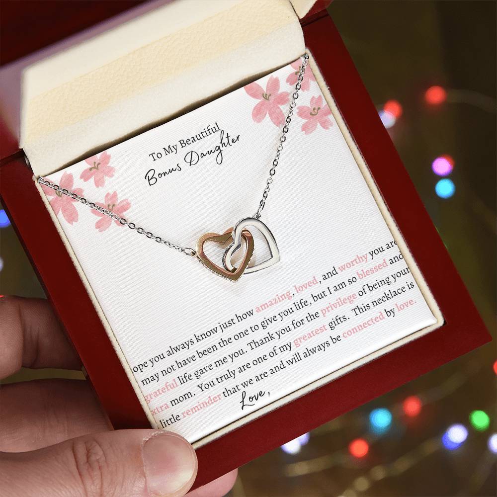 Get trendy with To My Bonus Daughter Interlocking Hearts Necklace - Jewelry available at Good Gift Company. Grab yours for $59.95 today!